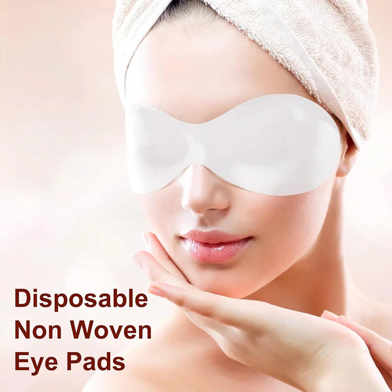 model wearing disposable eye mask paper patch for under eye nourishment and facial skincare treatment