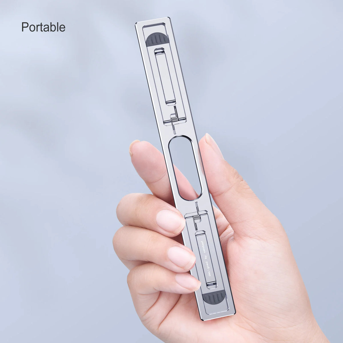 Ergonomic laptop stand with silver metal finish for clean workspace aesthetics