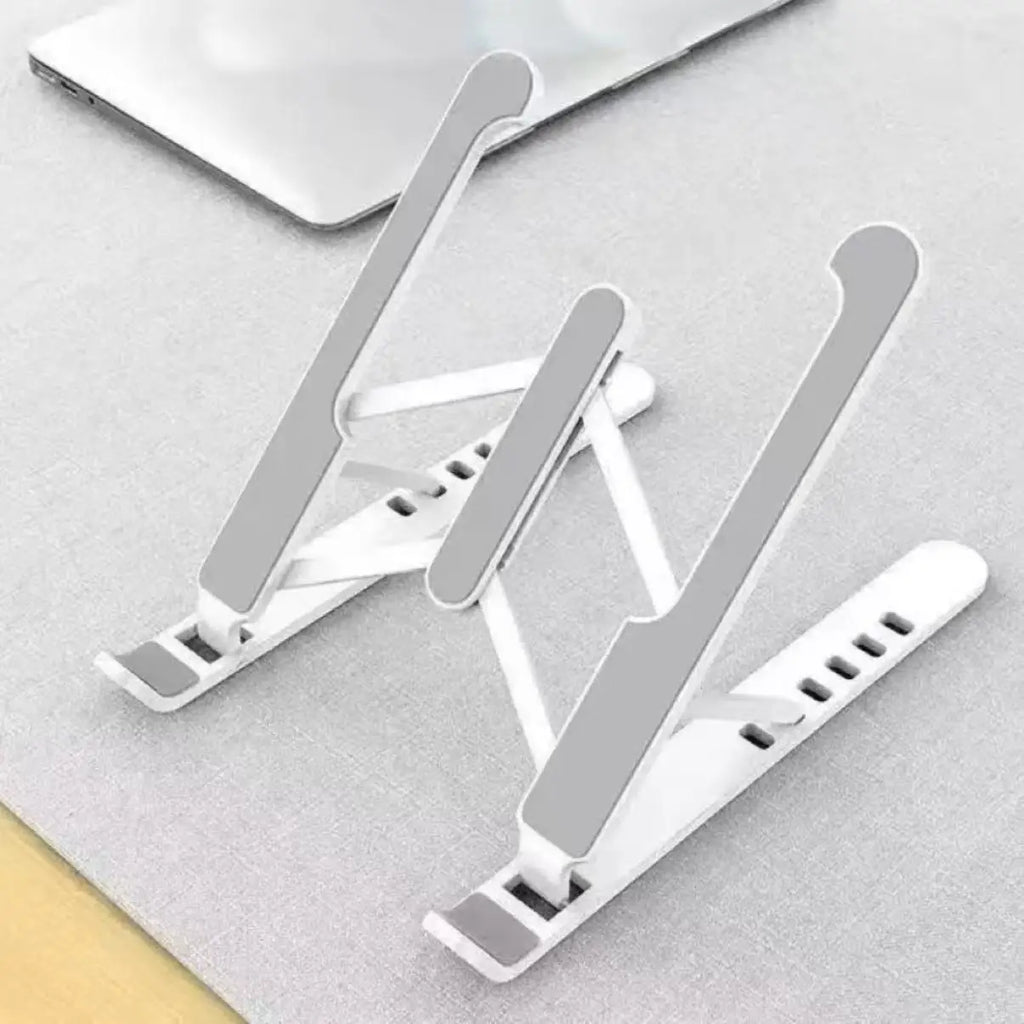 Compact foldable laptop stand for portable and travel use
