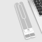 Lightweight foldable laptop stand in flat folded state