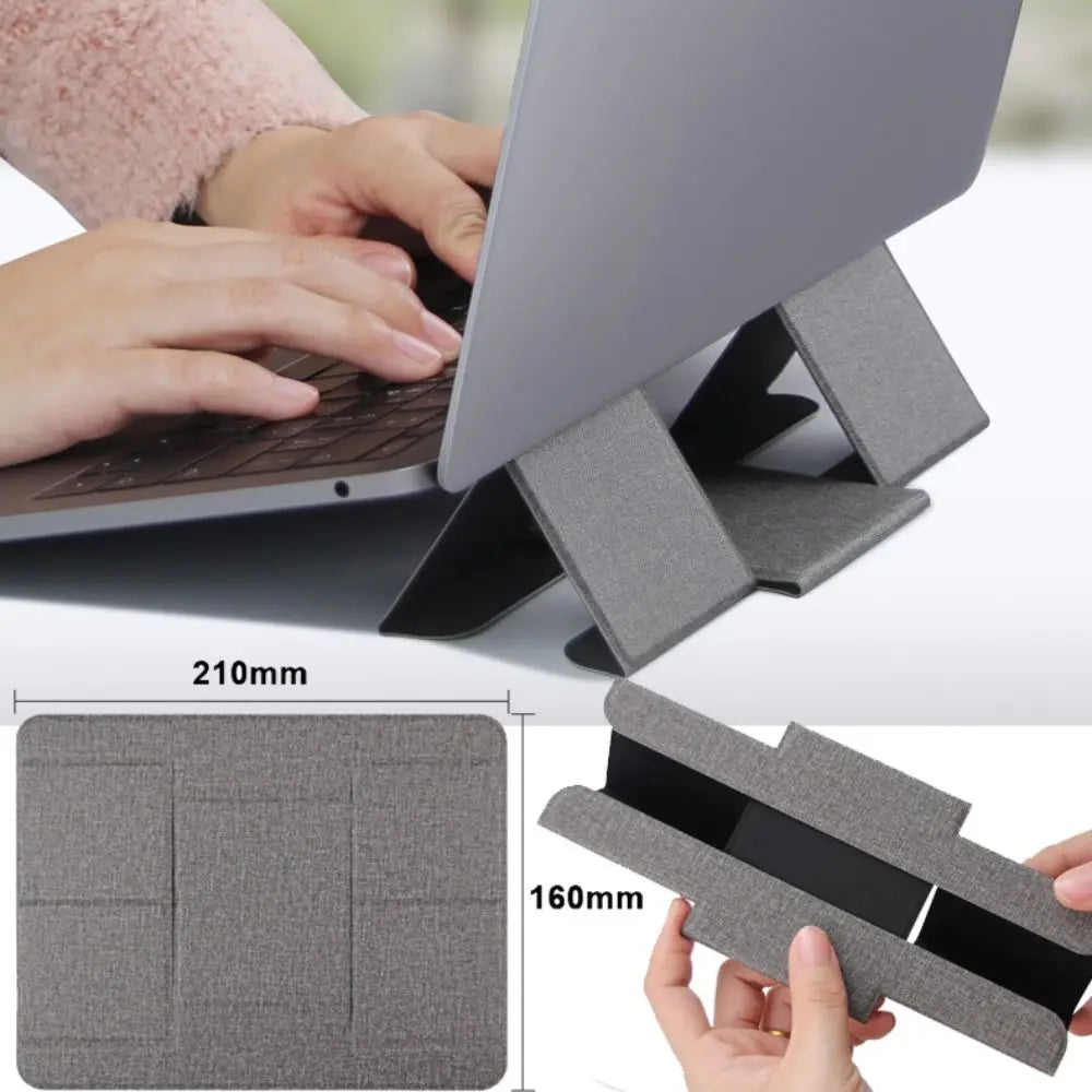 User typing comfortably on laptop using foldable laptop stand