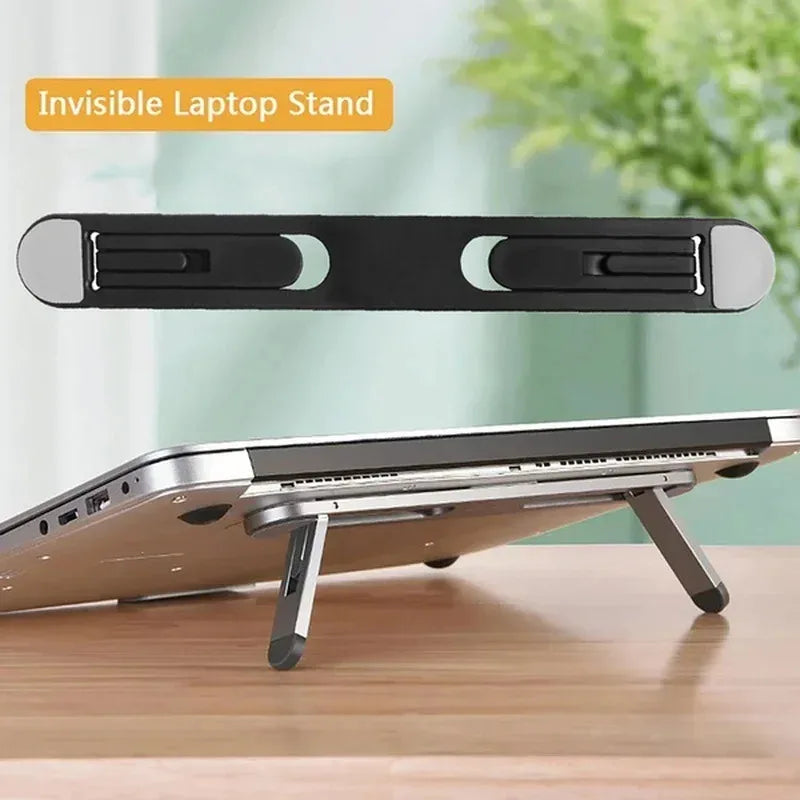 Invisible laptop stand attached to the bottom of a laptop for ergonomic desk setup