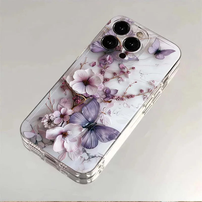 Phone case with floral and butterfly design on a light background