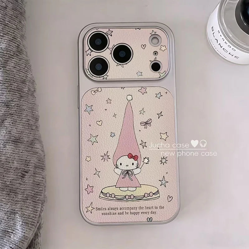 A light pink textured phone case with a Hello Kitty design, featuring a large camera cutout and a decorative illustration of Hello Kitty in a pink hat with stars and hearts, shown on a light surface with a gray knit fabric and a cosmetic jar nearby.