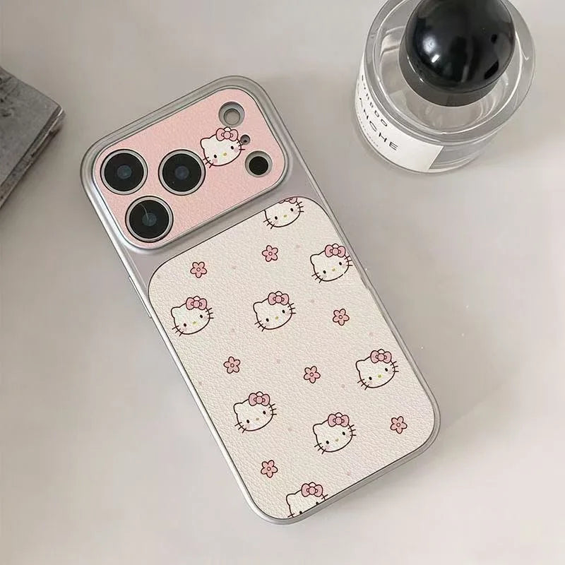A Hello Kitty phone case with a pink camera ring and a white patterned back, styled on a light surface next to a perfume bottle.