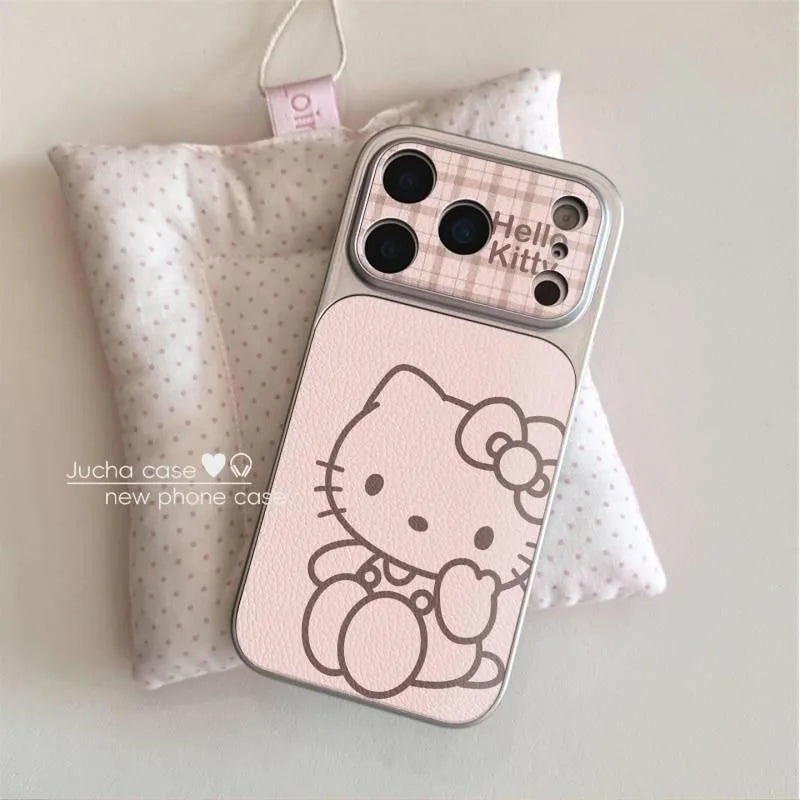 A Hello Kitty phone case with a pink and white plaid camera section and a large pink panel featuring the Hello Kitty cartoon character, displayed on a white polka-dot cushion.