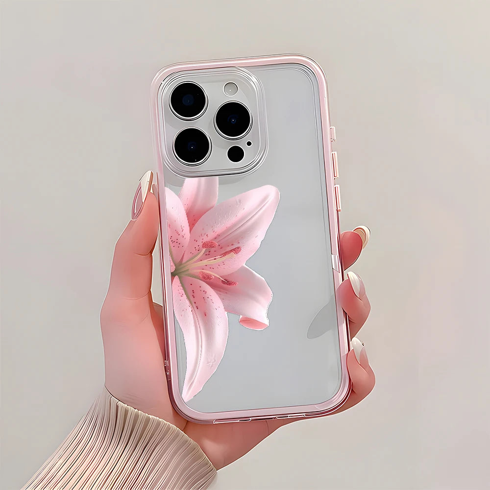 Phone case with pink flower design held by a hand against a light background