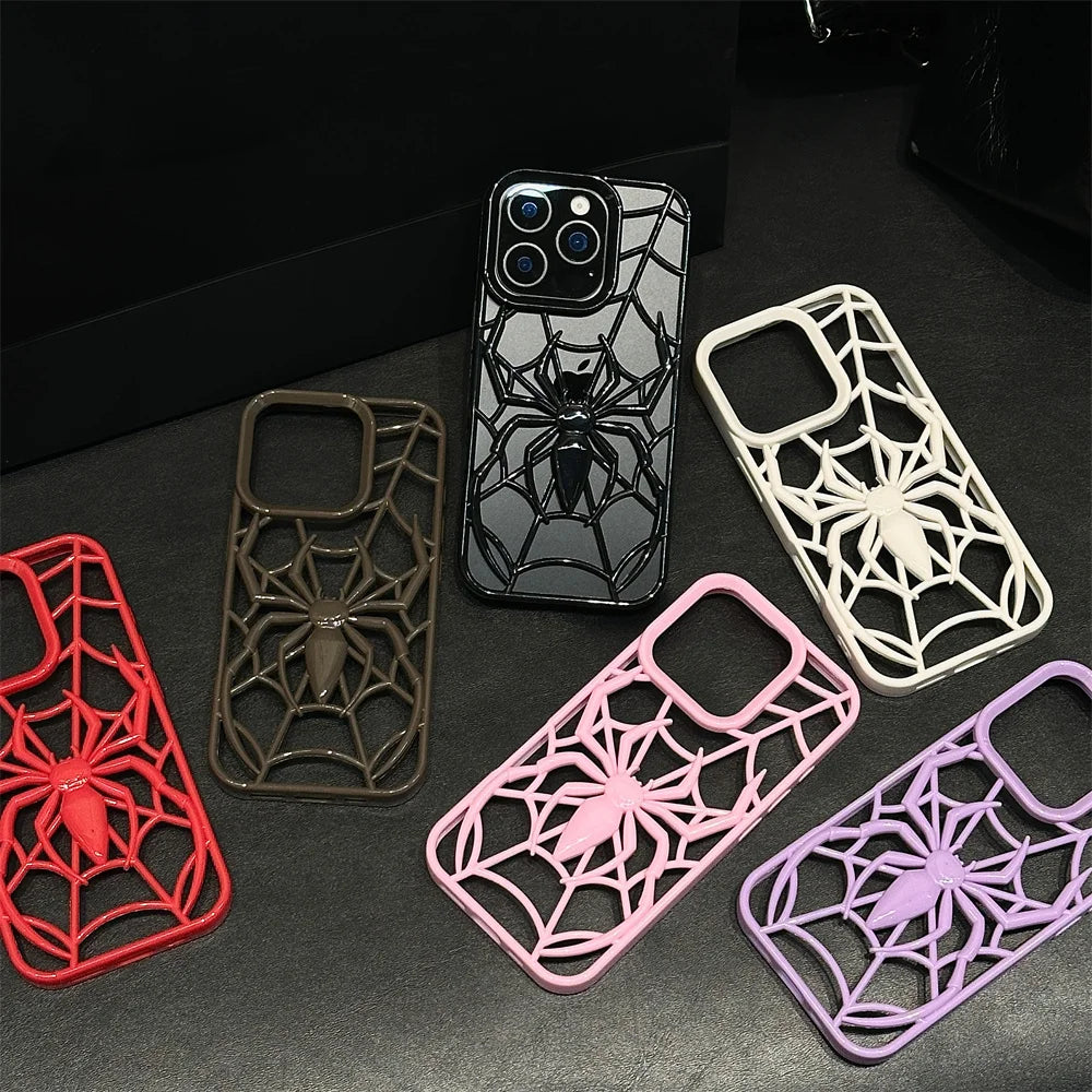 Spider-themed phone cases in various colors on a dark surface