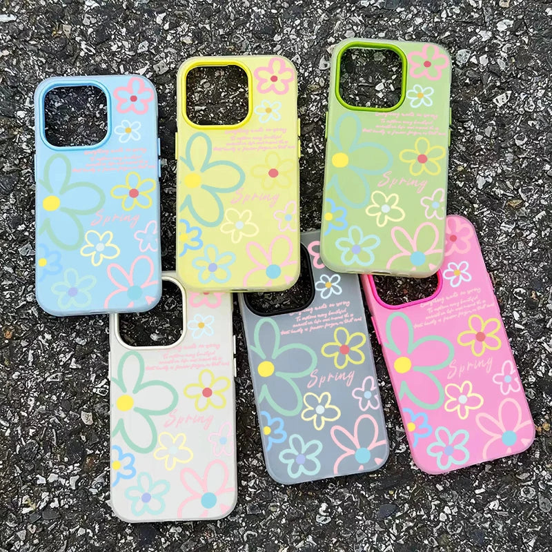 Set of colorful floral phone cases on a textured surface