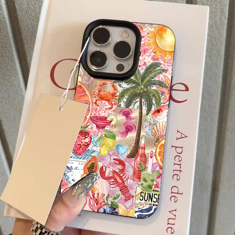 Phone case with tropical design held over a book
