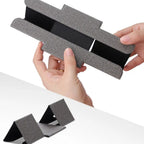 Hands holding lightweight foldable PU leather laptop stand
