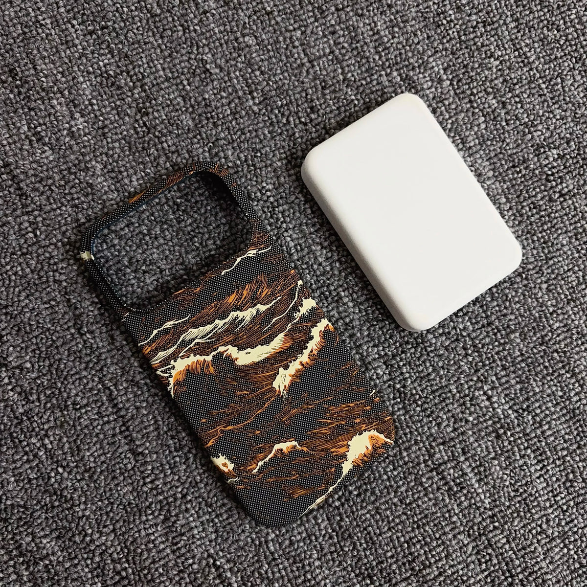Phone case with marble pattern on a textured surface