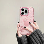 Soft matte pink phone cover featuring a cute cartoon character face.
