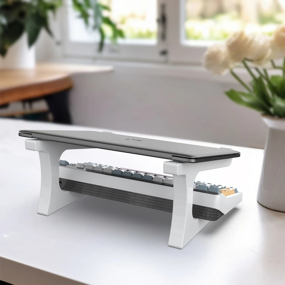 Portable adjustable desktop laptop stand setup on office desk