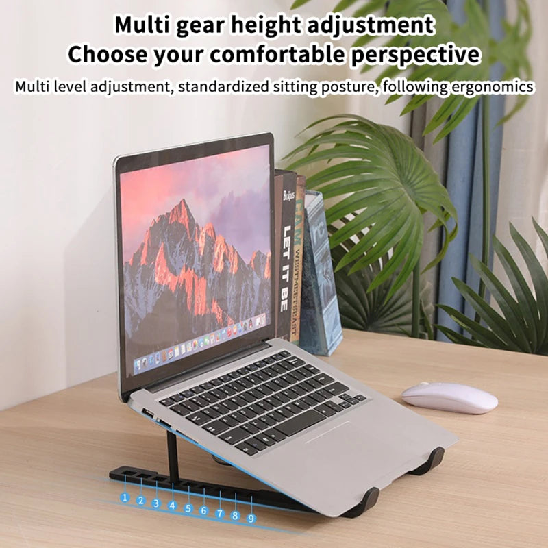 Portable laptop cooling pad stand set up on office desk with elevated screen