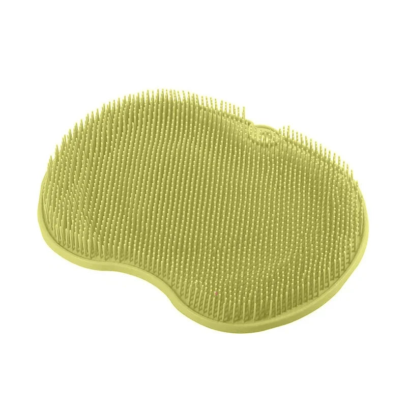 silicone foot scrubber in green color for exfoliating feet and stimulating circulation in shower