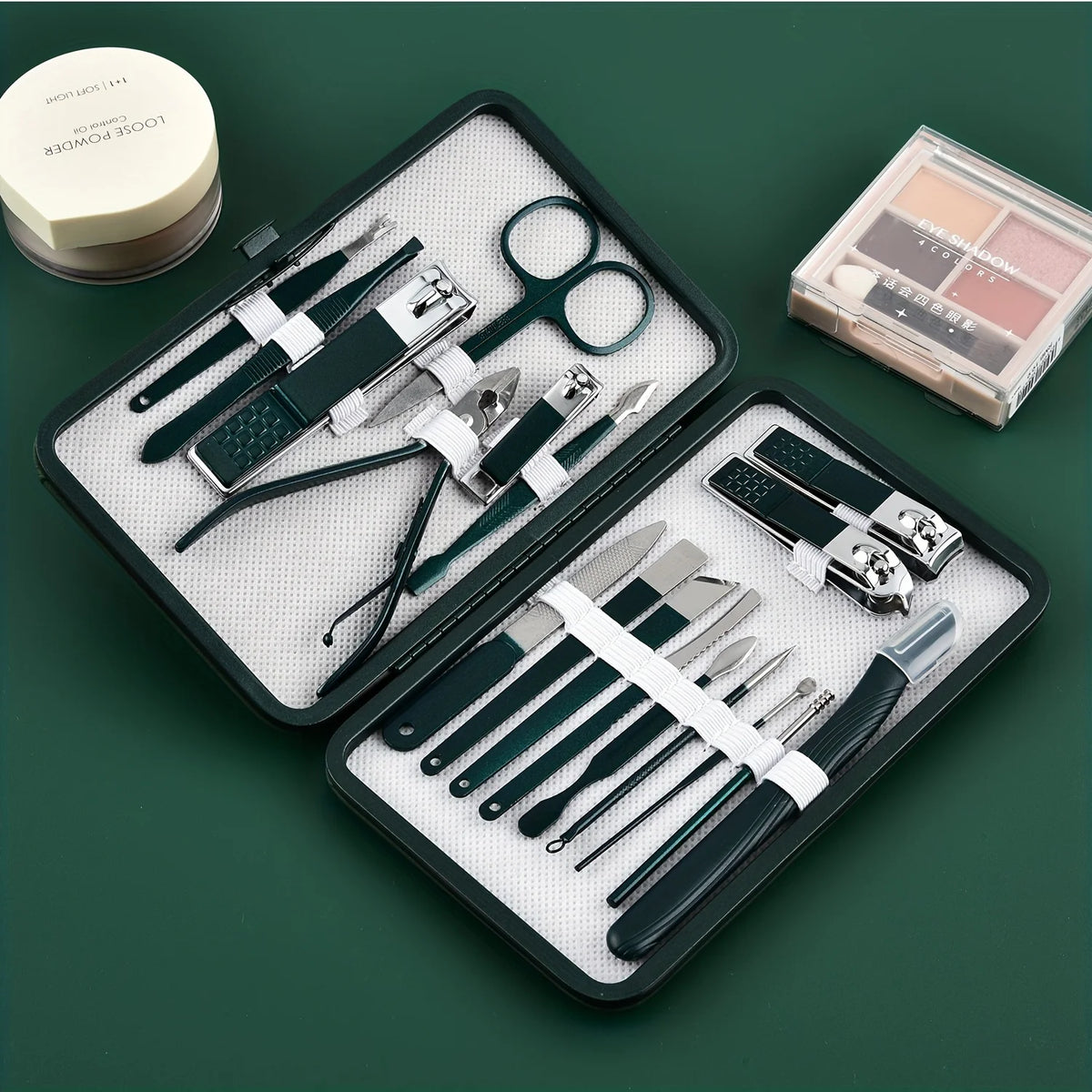 stainless steel manicure set open case angled view showing precision nail clippers and grooming tools