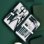 stainless steel manicure set inside dark green leather pouch for professional nail trimming at home
