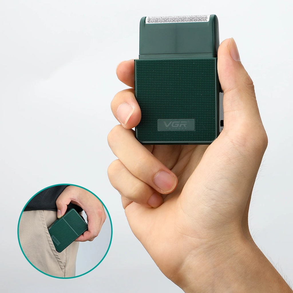 vgr rechargeable beard trimmer held in hand showing compact portable size for travel grooming