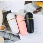 volcanic stone oil absorbing roller available in black pink and white casing color variants