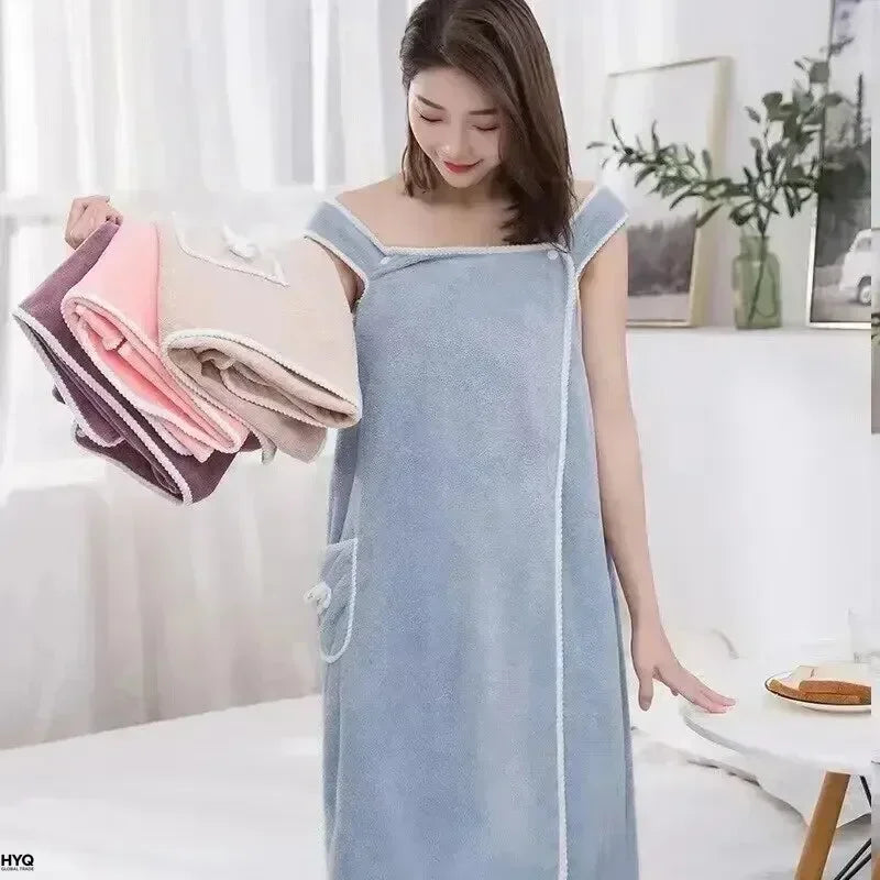wearable bath towel worn by woman in blue quick dry shower wrap dress with shoulder straps