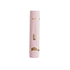 womens electric razor in peach pink color variant standing upright for stylish hair removal